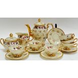 A Rudolf Wachter 'Bavaria' part tea set decorated with floral sprays and gilt/gold-overlay