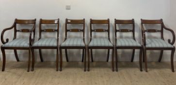 A set of six (4+2) Regency style mahogany dining chairs, with brass inlaid rest and rail back,