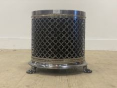 A Regency design steel waste paper bin of cylindrical outline, the latticed case with rosette motif,