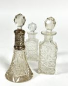 A Edwardian crystal conical Birmingham silver mounted top perfume bottle with faceted ball