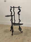 A floral cast iron three tier plant stand of 19th century design H77cm