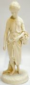 An antique Parian ware figure of a girl with basket of flowers (h- 39cm)
