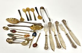 A collection of flatware including a set of five horn egg spoons, pair of Epns chased berry