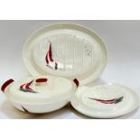 A group of Palissy "Regatta" pattern dinnerware decorated with red sailboats comprising a lidded