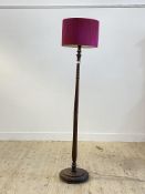 A 1930's / 40's turned oak lamp standard, complete with cylindrical shade H177cm