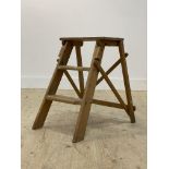 A vintage set of two rung pine step ladders H57cm