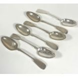 A set of four Victorian Exeter silver Fiddle pattern desert spoons, (L x 18cm) Exeter 1864 and a