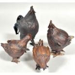 A pottery group of a hen, two chicks and cockerel modelled in natural poses, some areas of losses to