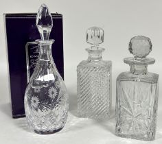 A Edinburgh Crystal baluster wine decanter with floral sprays, (H x 32.5cm) and two square cut
