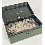 A tin cash box with a large collection of Elizabeth II six pence pieces. (A Lot) 4819g