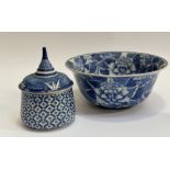 A large blue and white, lotus vine decorated decorative bowl (w-32cm h-14cm) and a blue and white
