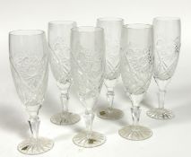 A set of six Parad Hungarian crystal slice cut Champagne flutes raised on faceted baluster stems and