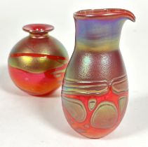 A Phoenician Maltese glass red/orange iridescent overlaid jug, signed verso, (Hx12.5cm) and a ball