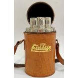 A Du Pont Finesse travelling triple flask with leather carry case containing three glass flasks with