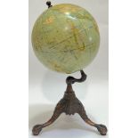 A Rand McNally & Co's eight inch terrestrial globe on tripod base (h- 38.5cm)