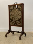A mid 19th century mahogany metamorphic fire screen, three sliding embroidered silk lined panels,