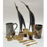 A collection of various cow horn items comprising three beakers (tallest h-12.5cm smallest h-6cm),