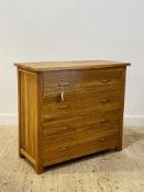 A Contemporary oak chest fitted with four drawers, raised on stile supports H89cm, W100cm, D44cm