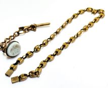 A Victorian 9ct gold T bar with section of chain and carved hardstone mounted gilt metal seal and