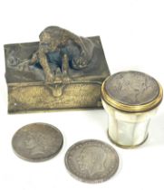 A Eastern miniature cast brass box with seated ape on top and sack, cover loose, (H x 7.5cm L x
