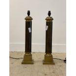 A pair of brass and faux marble table lamp bases of column form H61cm