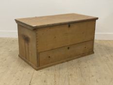 A Victorian pine mule chest, the hinged top opening to an interior with two drawers and a candle