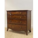 A Regency mahogany bow front chest, fitted with four long graduated drawers having ebonised string