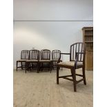 A Set of seven (6+1) Georgian mahogany dining chairs, each with a moulded spar back over drop in