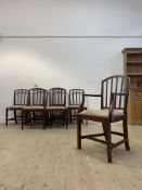 A Set of seven (6+1) Georgian mahogany dining chairs, each with a moulded spar back over drop in