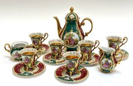 A desden style espresso set on baluster form comprising six espresso cups, six saucers, a coffee pot