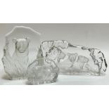 A group of three Kosta Boda clear glass plaques/desk ornaments depicting lions (tallest- h- 23cm,