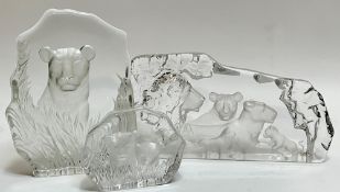 A group of three Kosta Boda clear glass plaques/desk ornaments depicting lions (tallest- h- 23cm,