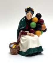 A Royal Doulton figure of "The Old Balloon Seller". (h- 20cm) (no signs of chips or repairs) (marked