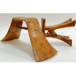 Two African wooden headrests, possibly Ethiopian(?), (h- 9cm, w- 15cm, and h- 17cm, w- 36cm)