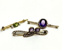 A 9ct gold bar brooch set oval faceted Amethyst mounted in rope pattern border, ( L x 1cm x W 0.