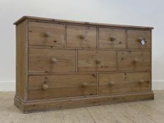 A Victorian style multi drawer chest, fitted with nine drawers, raised on a skirted base (a/f)