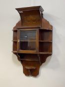 An Edwardian inlaid mahogany wall hanging cabinet, with glazed door and open shelves H73cm