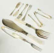 An Edwardian pair of mother of pearl handed Epns fish servers, three various pairs of silver sugar