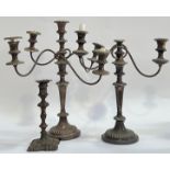 A group of silver plated candelbrum/candlestick holders comprising a large four-armed stick with