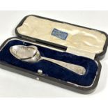 A unusual Edwardian Sheffield silver baby's Christening feeding spoon with collared lip to back,