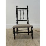 A Victorian ebonised and bobbin turned childs chair, H71cm