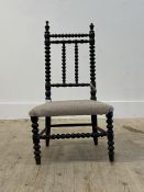 A Victorian ebonised and bobbin turned childs chair, H71cm