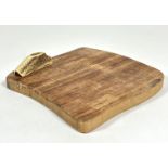 A Teak cheese board of shaped scrolling design mounted with stags horn handle to side. (H x 2cm x