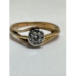 A 18ct gold solitaire diamond ring, mounted in claw set illusion setting of open form, M/N, 3.03g