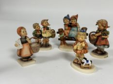A collection of six German Hummel pottery figures including, My Favourite Pony, Autumn Harvest and