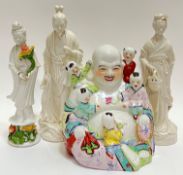 A group of Chinese ceramic figures comprising two blanc de chine figures in Eastern dress (man and