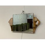 A mid century Art Deco style sectional clear and peach glass wall hanging mirror 31cm x 63cm