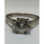 A 18ct white gold Diamond solitaire ring approximately 1ct mounted in claw setting, chip to edge and