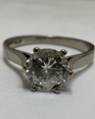 A 18ct white gold Diamond solitaire ring approximately 1ct mounted in claw setting, chip to edge and