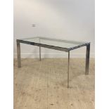 A contemporary chrome dining table, with glass top on box section supports H75cm, W160cm, D80cm